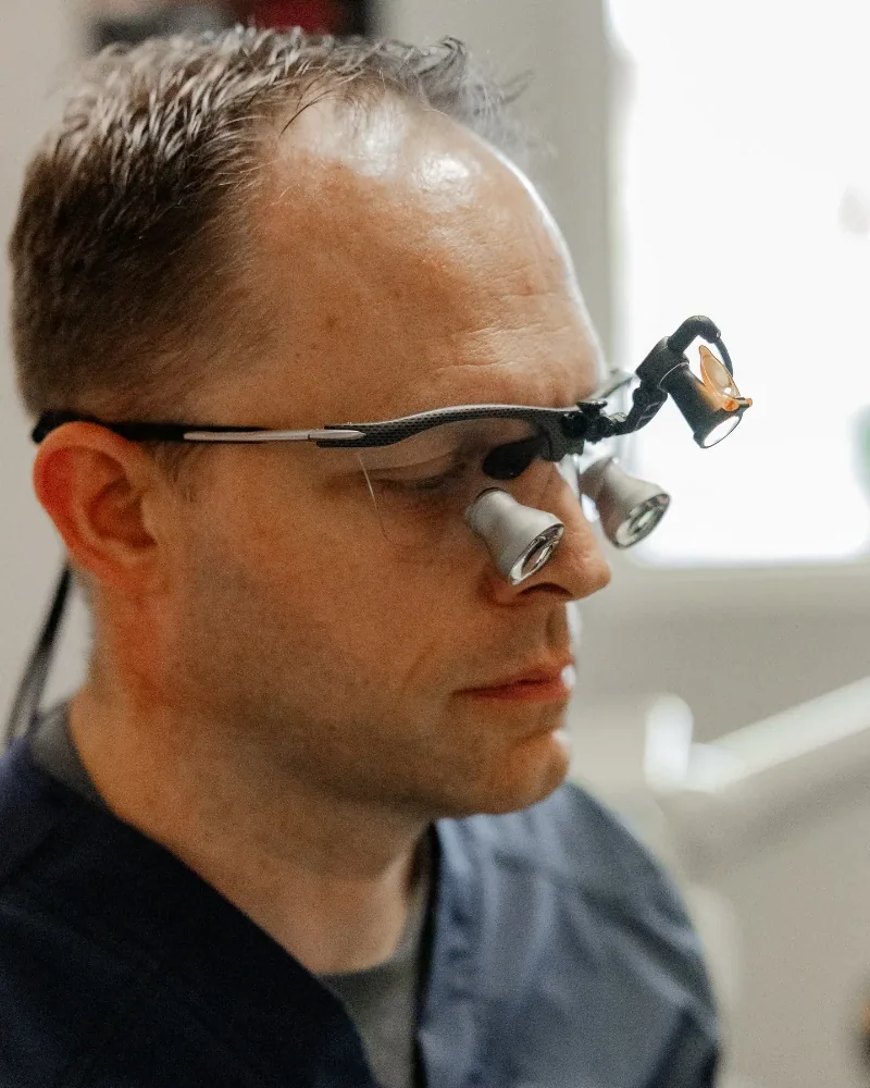 Dr. Taylor Workman wearing magnification loupes